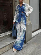 Pantalones anchos con bolsillos elásticos y estampado étnico único